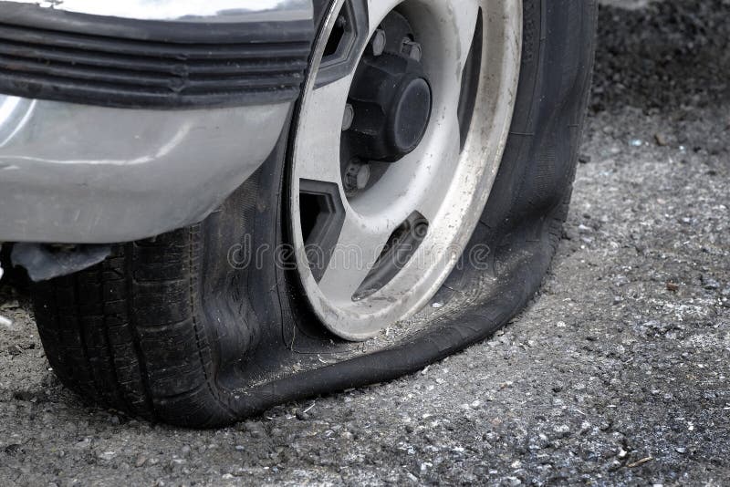 Flat Tire Vehicle Car on Road Danger Dangerous Stranded Stock Photo