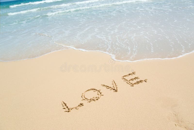 Photo of beach and love in sand. Photo of beach and love in sand.