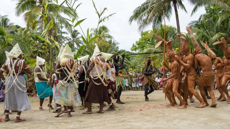 Strange dance ceremony with mud people, dancers Solomon Islands