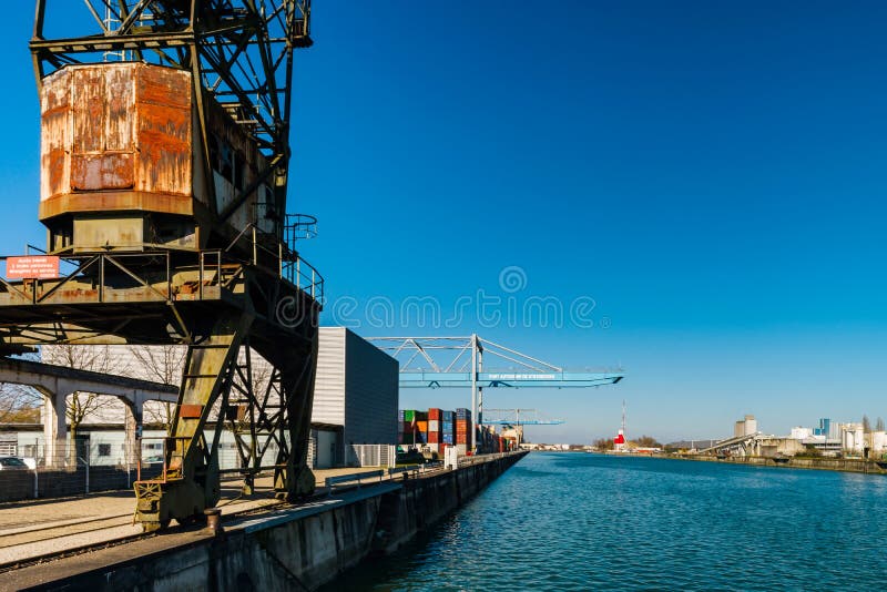 Strasbourg cargo shipping port terminal, sunny day with bluew sk