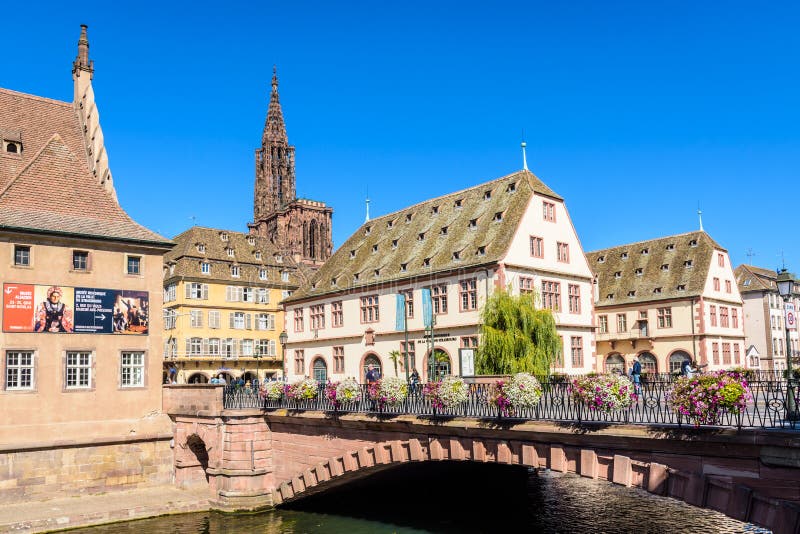 The Historical Museum and steeple of Notre-Dame cathedral in Strasbourg, France