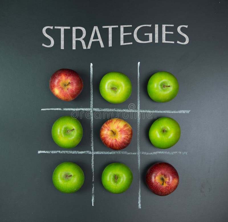 Strategies concept using apples in tic tac toe game. Strategies concept using apples in tic tac toe game