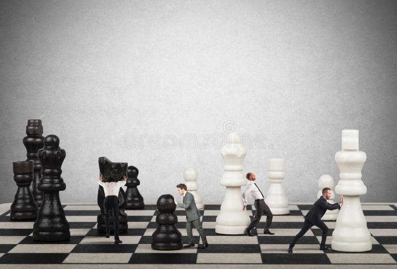 Businessmen move the chess pieces. Strategy and tactics in business concept