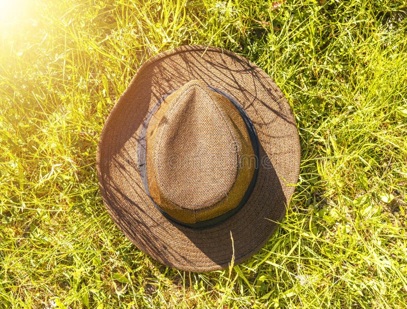 Straw Hat Lying on Grass or Lawn in Summer Stock Photo Image of vacation, brown 222142442