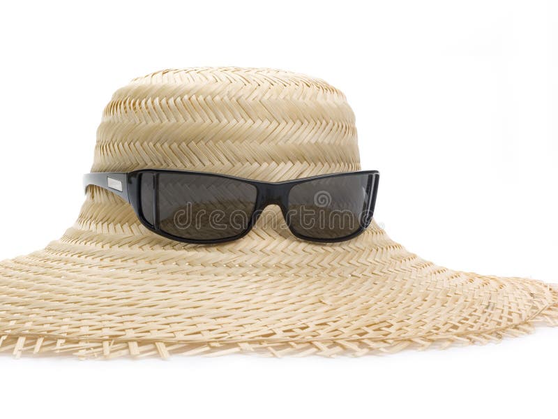 Straw hat and sunglasses stock image. Image of hatband 7309565