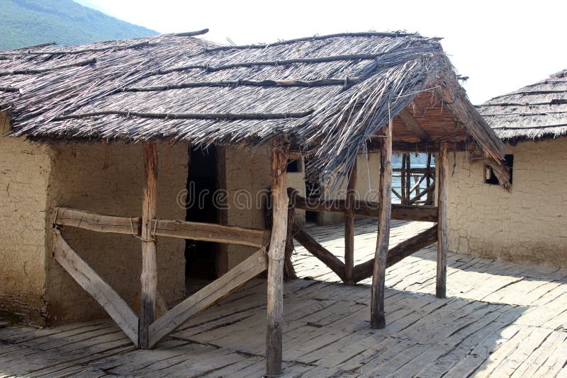 Straw house grunge concept stock photo. Image of jungle 154409974