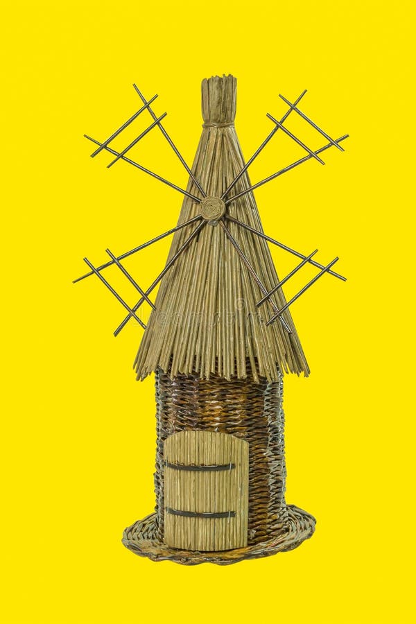 Straw mill on an isolated yellow background
