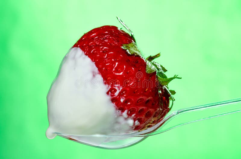 Strawberries with Cream on a Transparent Spoon. Yellow Background Stock  Photo - Image of background, transparent: 152147082