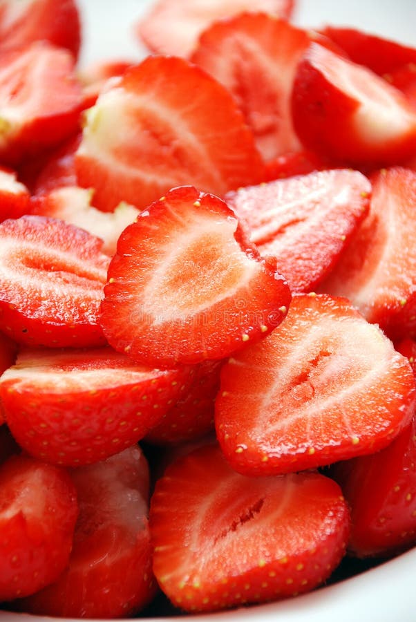 Strawberries cut in half stock photo. Image of closeup 16465698