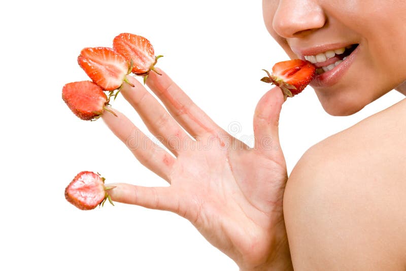 Strawberries picked on fingertips