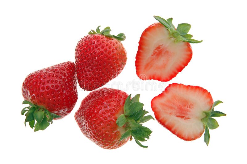 cutting strawberry on white background