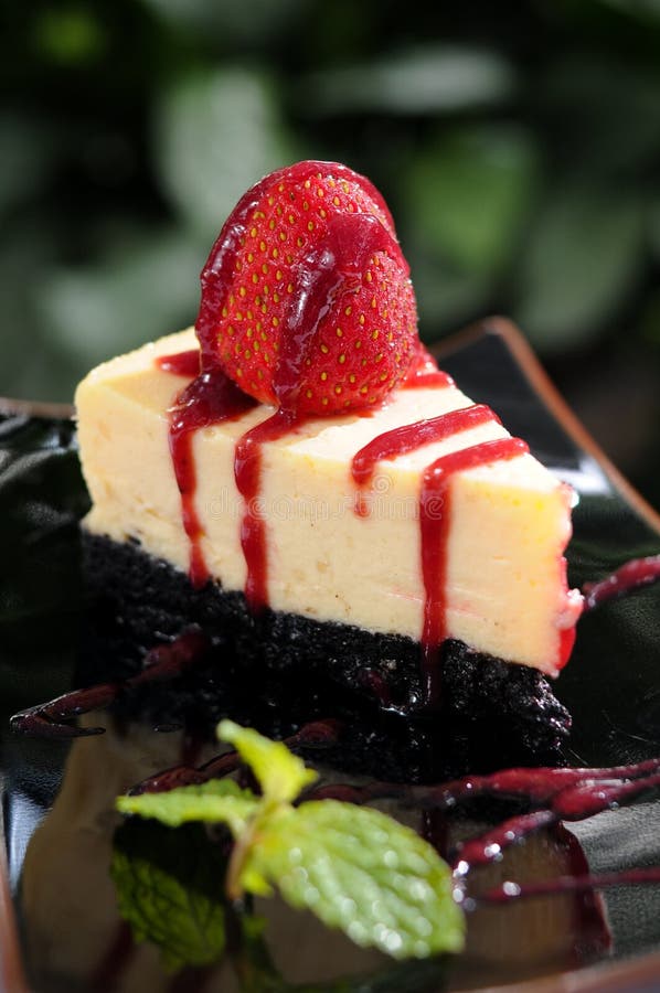 Strawberry cheesecake in black plate