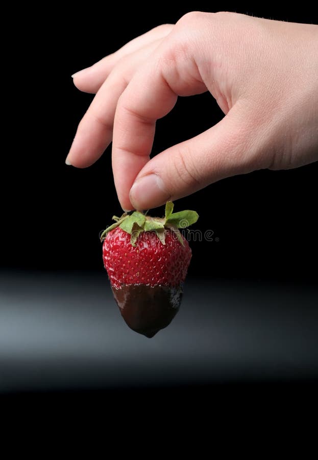 The strawberry in chocolate sauce