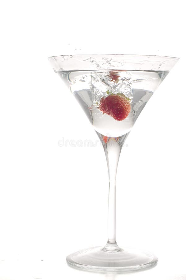 Strawberry into cocktail glass