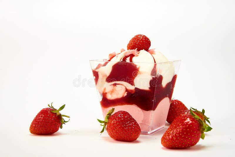 A Creamy Pink Iris Flower with Water Droplets on the Petals Stock Photo