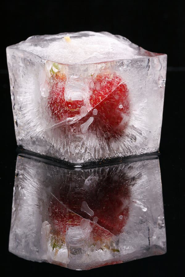 Strawberry in ice cube