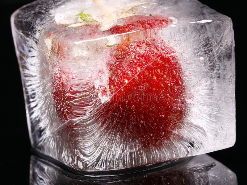 Strawberry in ice cube