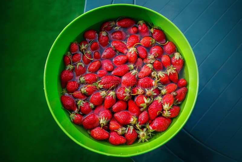 Strawberry inside cold water stock photography
