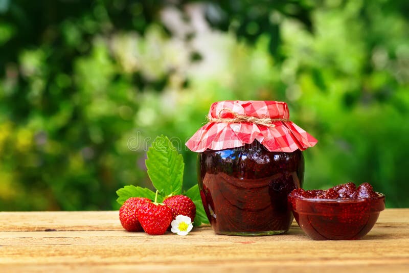 Strawberry jam on wooden table royalty free stock photography Strawberry jam on wooden table royalty free stock photography
