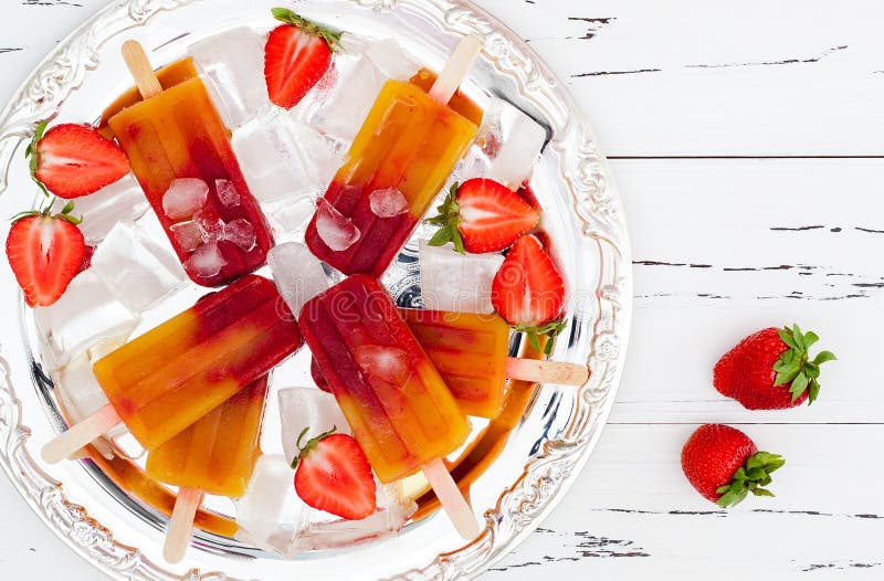 Strawberry mango popsicles - ice pops - paletas.