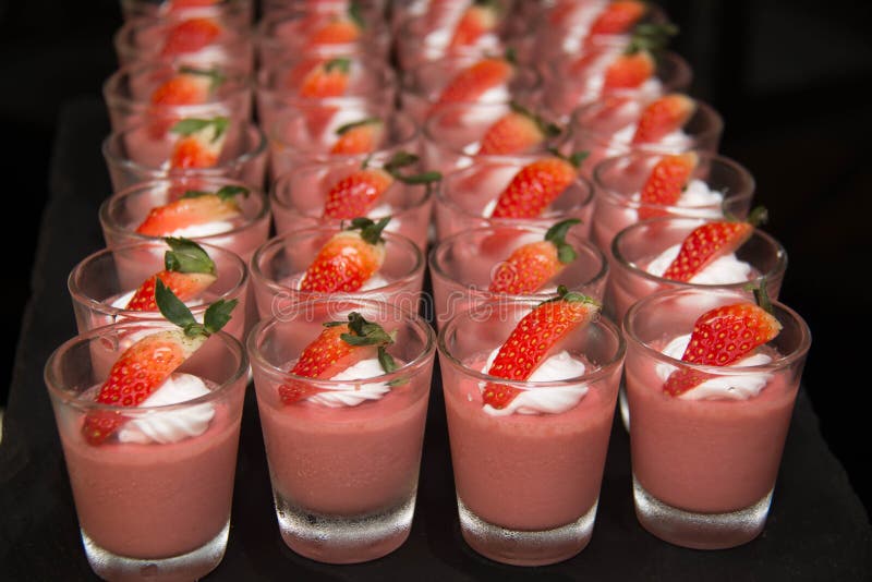 Strawberry panacotta cream dessert on the table royalty free stock photo Strawberry panacotta cream dessert on the table royalty free stock photo