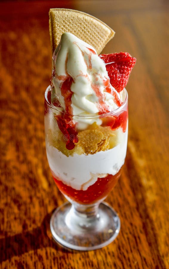The Strawberry parfait on the table stock image