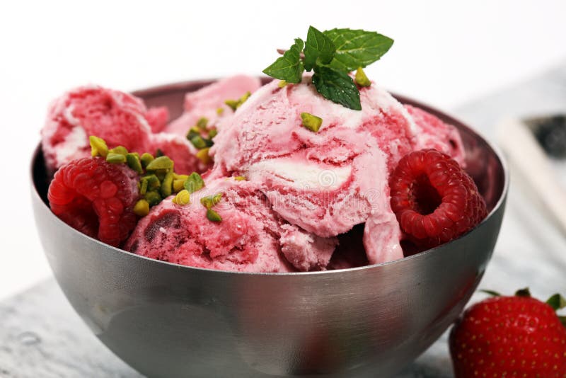 Strawberry And Raspberry Ice Cream Scoop With Chopped Nuts And W Stock ...