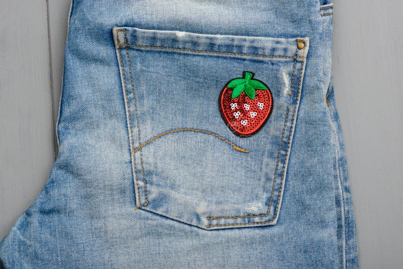 Sewing Beautiful Patches To Jeans Stock Photo - Image of heart, girl:  143368206