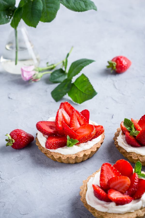 Strawberry Vanilla Cream Cheese Tarts Over Light Gray Table Stock Photo