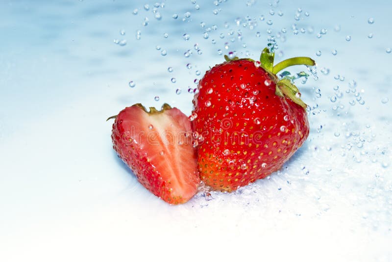 Strawberry in water splash