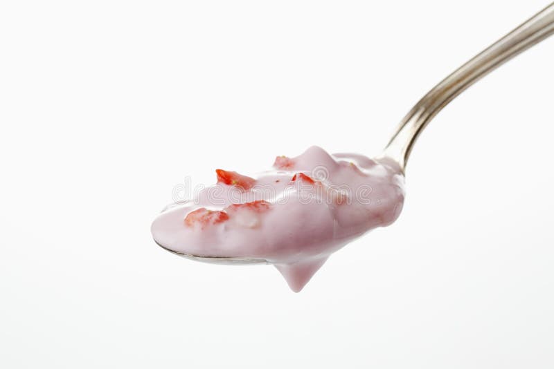 Strawberry yogurt on spoon