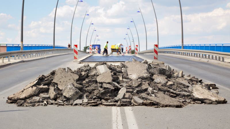 Damaged asphalt road and bridge in reconstruction, Novi Sad Serbia. Damaged asphalt road and bridge in reconstruction, Novi Sad Serbia