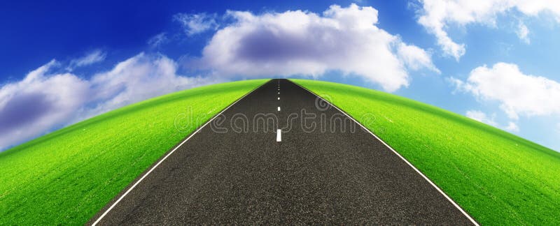 A highway crossing a lush green landscape towards the horizon. A highway crossing a lush green landscape towards the horizon