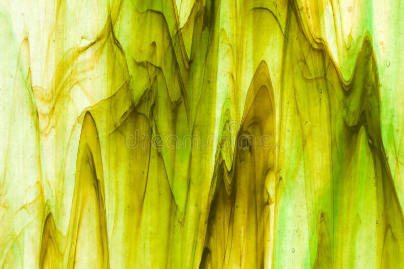 Streaky verde e marrom do vidro manchado imagem de stock Streaky verde e marrom do vidro manchado imagem de stock