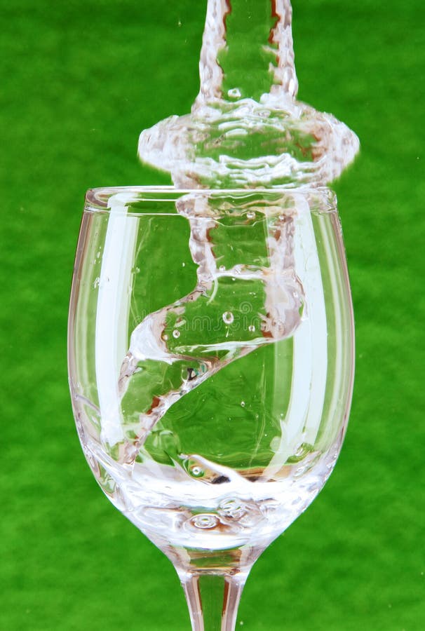 Stream of Water Falling into the Glass. Stock Photo Image of water