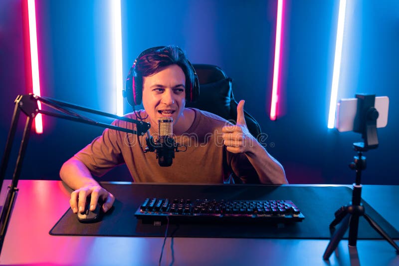 Streamer live steaming on media social online by smartphone. Pecuniary. stock photos