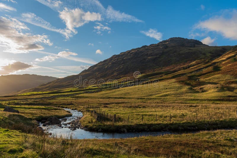 A streaming running around Hardknott pass stock image A streaming running around Hardknott pass stock image