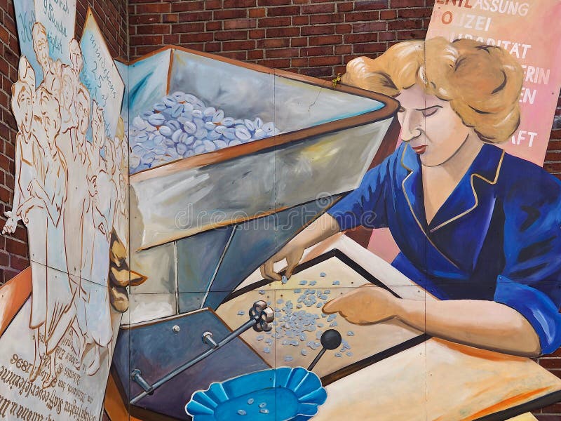 Street art-a seamstress at work in Hamburg stock image Street art-a seamstress at work in Hamburg stock image