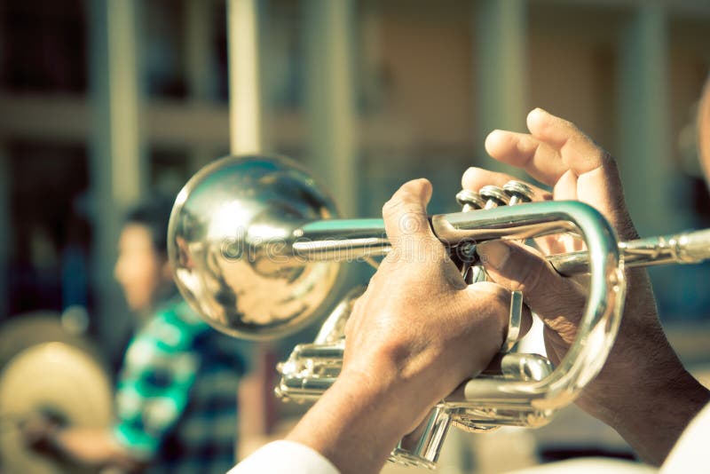 Street band playing, selective focus on the hands royalty free stock photography