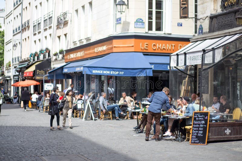 Street with Cafes and Bars in Paris Editorial Photography - Image of