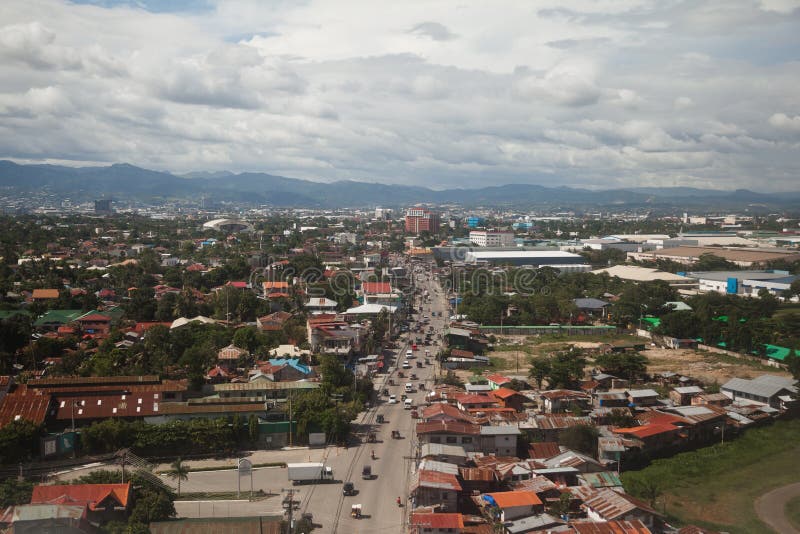 Street in Cebu editorial photo. Image of clouds, urban - 68252961