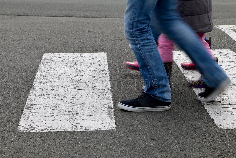 Street - children crossing a crosswalk royalty free stock photography