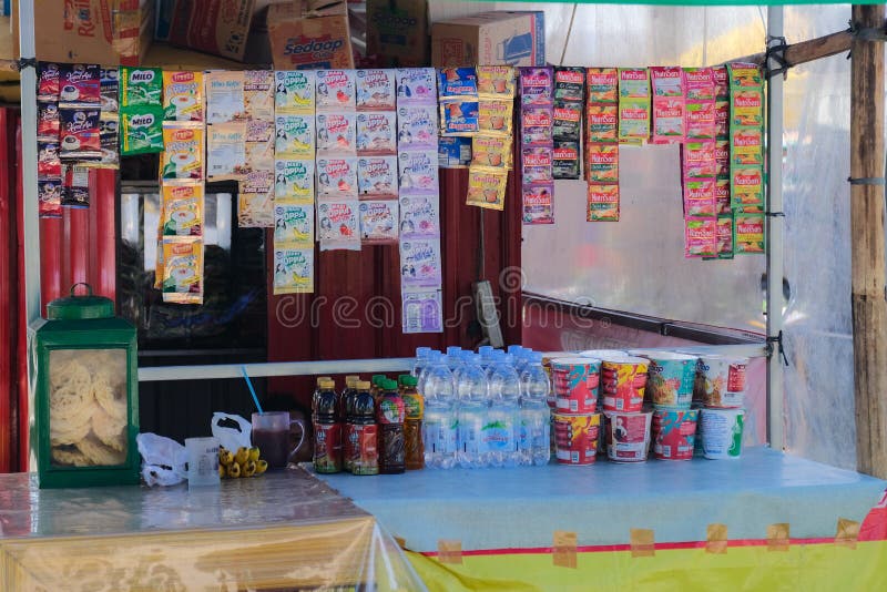 A Street Food Hawker of Selling Various Instant Food and Drinks