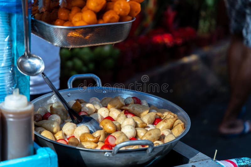 Street Food at a Local Market in the City of Manila in Philippines