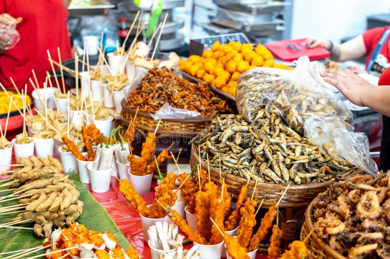 Street Food at a Local Market in the City of Manila in Philippines