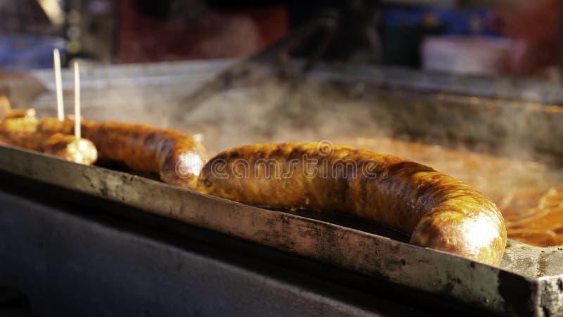 Street food cooking on big frying pan outdoor Stock Photo