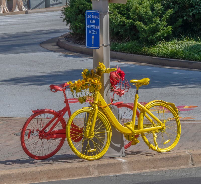 CRYSTAL CITY, Arlington, USA - September 6, 2018: Street furniture in the form of ornamental bicycles, marking the bike track.