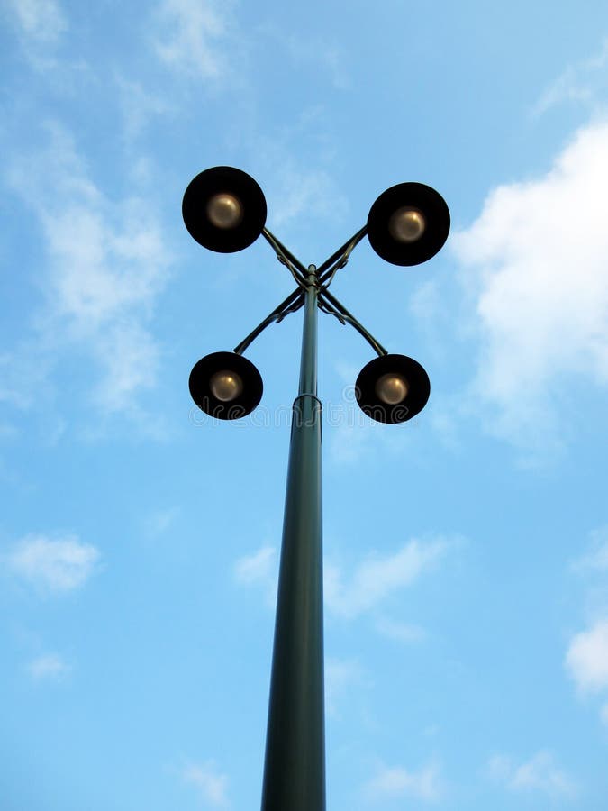 Street Lamp with Four Hands Stock Image Image of lamp, street 24308643
