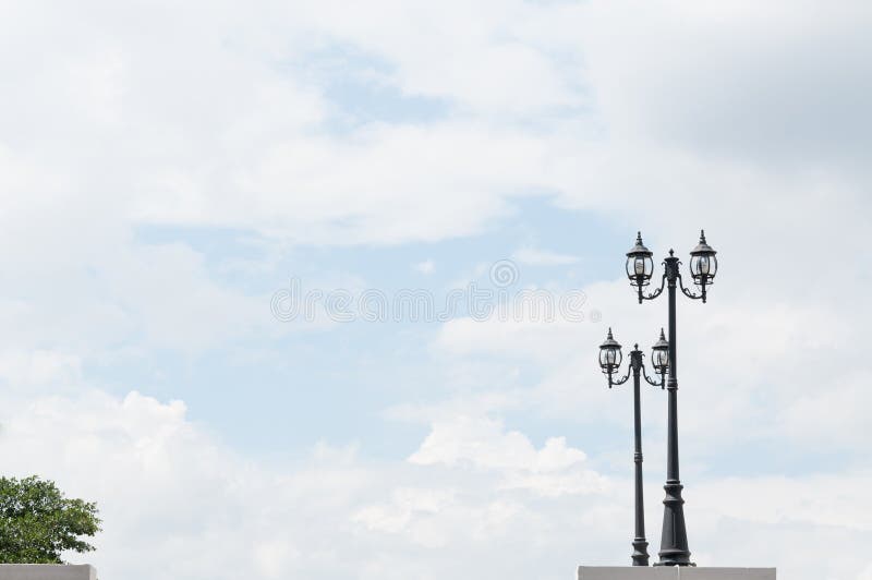 Street lamp retro on blue sky stock photos