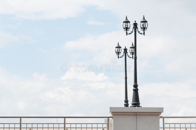Street lamp retro on blue sky stock photo